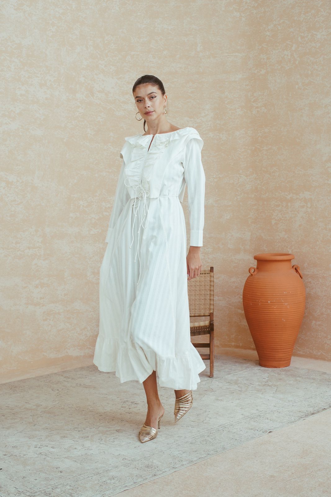 Ethereal White Dress with Ruched Bodice and Ruffled Hem