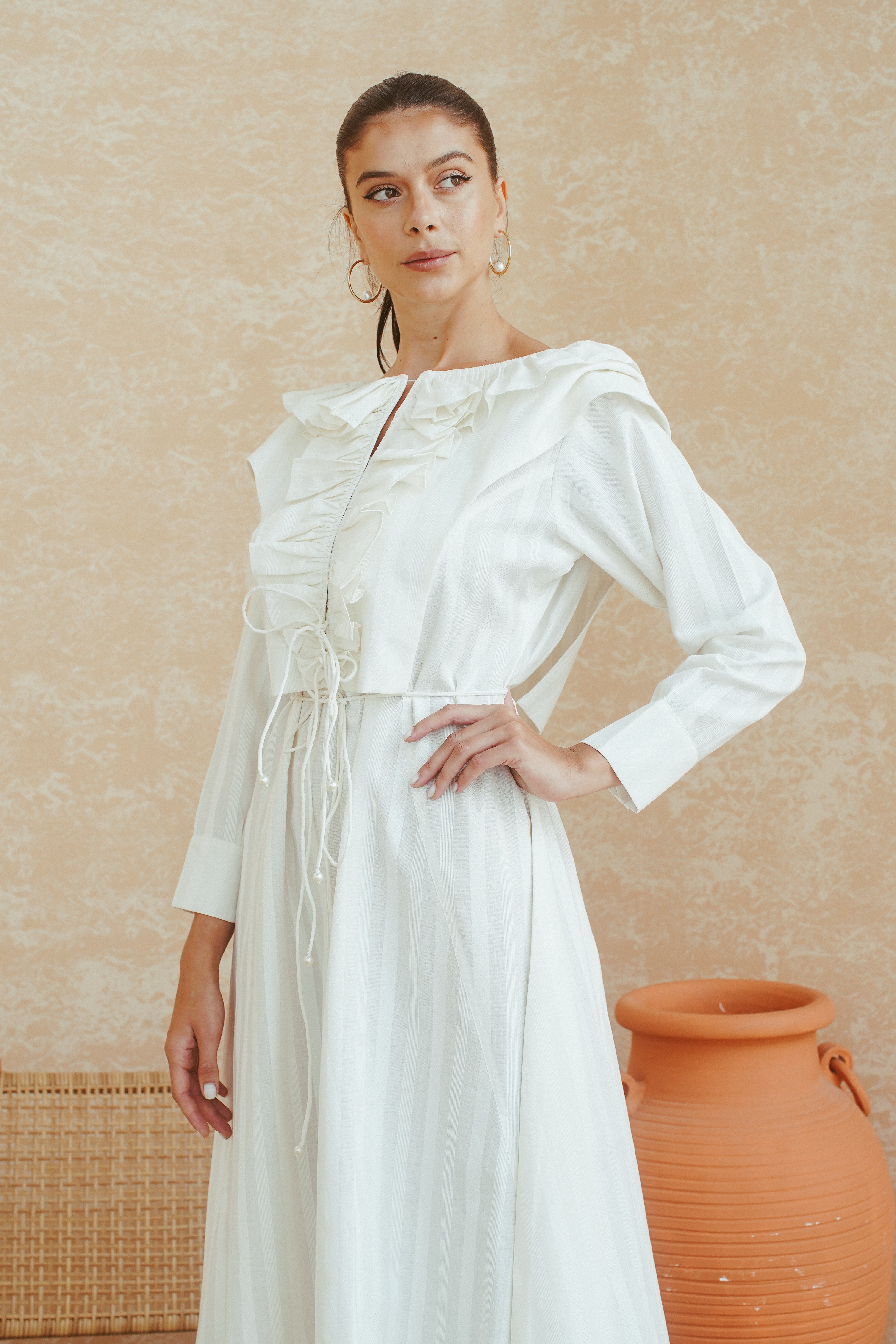 Ethereal White Dress with Ruched Bodice and Ruffled Hem